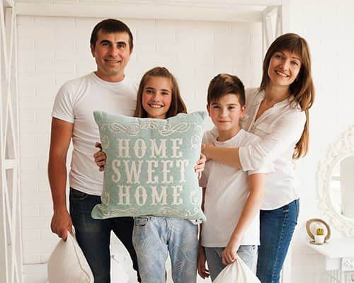 Happy Family Holding Home Sweet Home Text Pillow in Texas